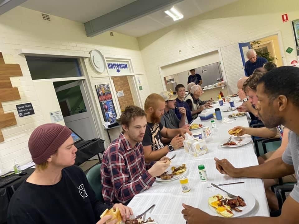 People sharing a meal around a table