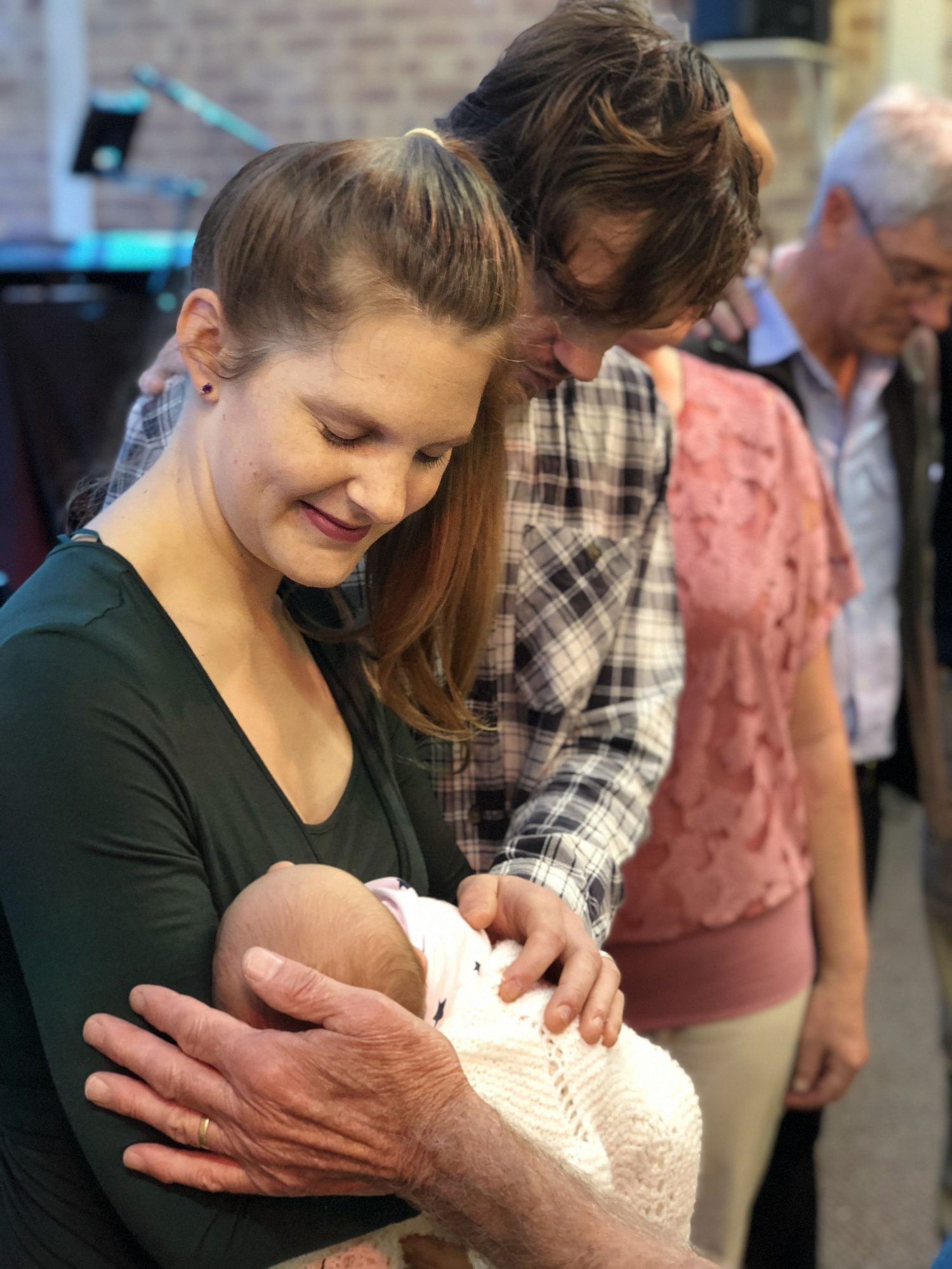 A mum holding her baby