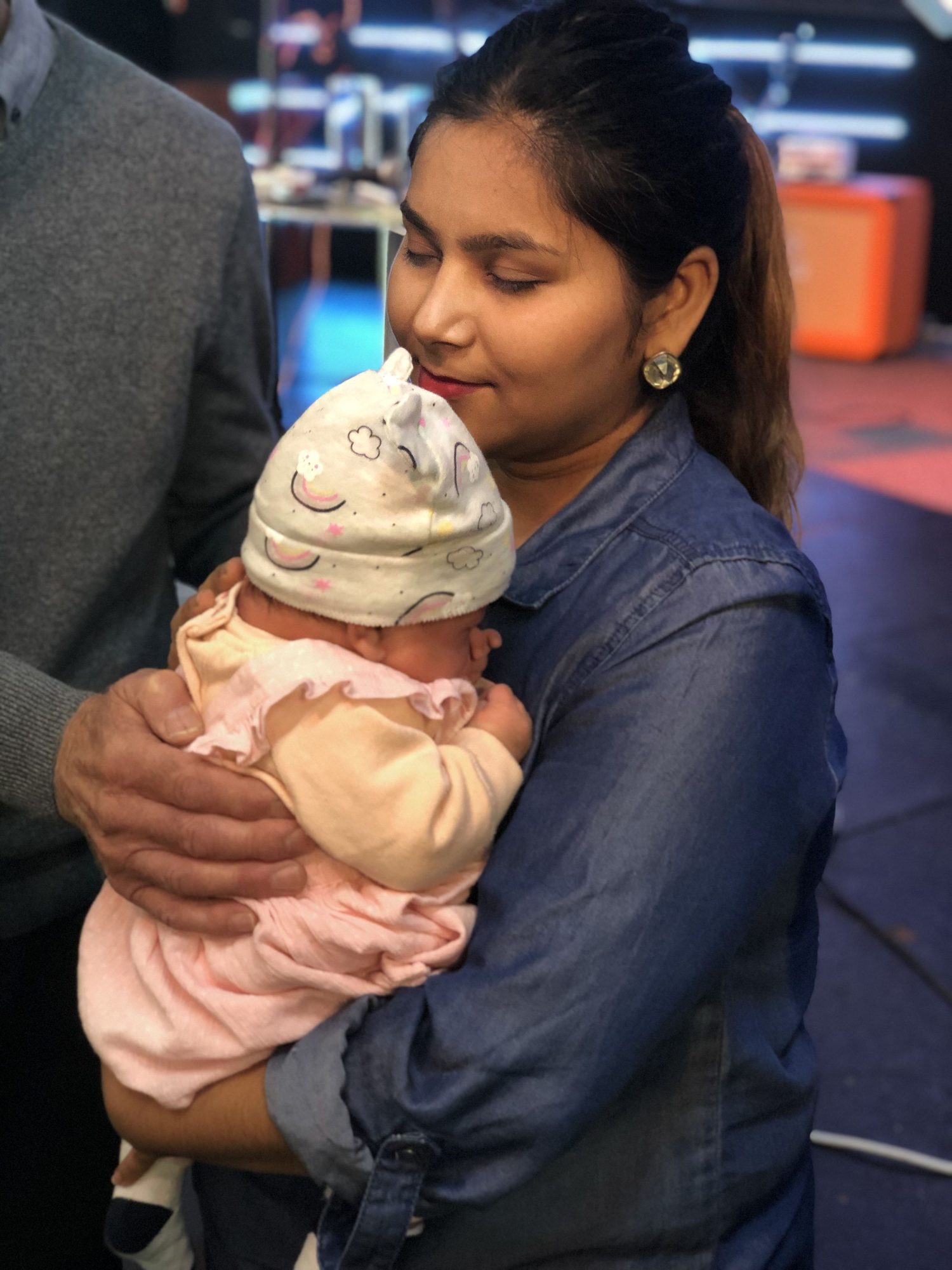 A mum holding her baby
