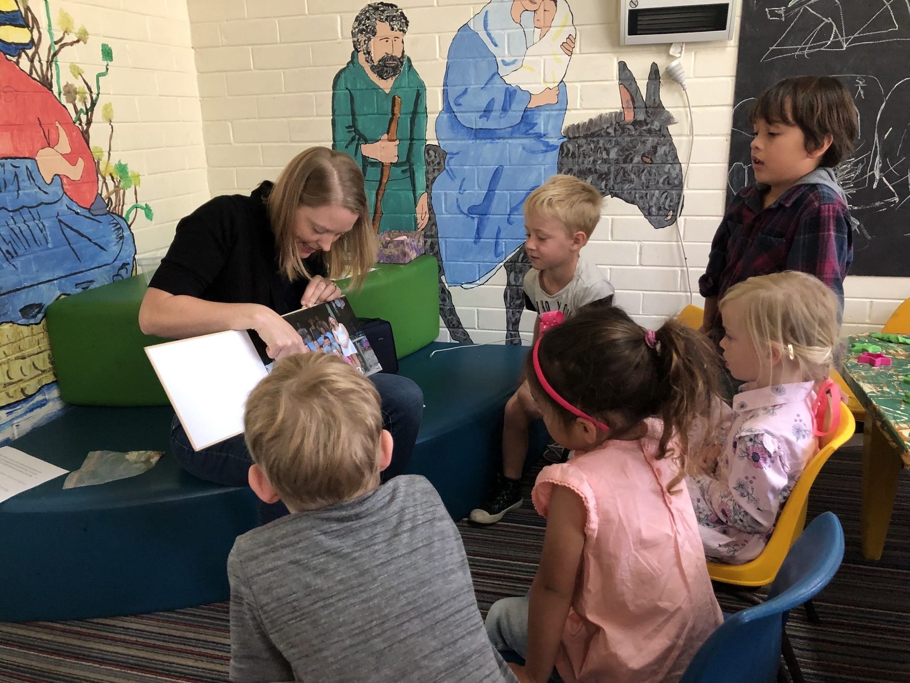 Young children reading together