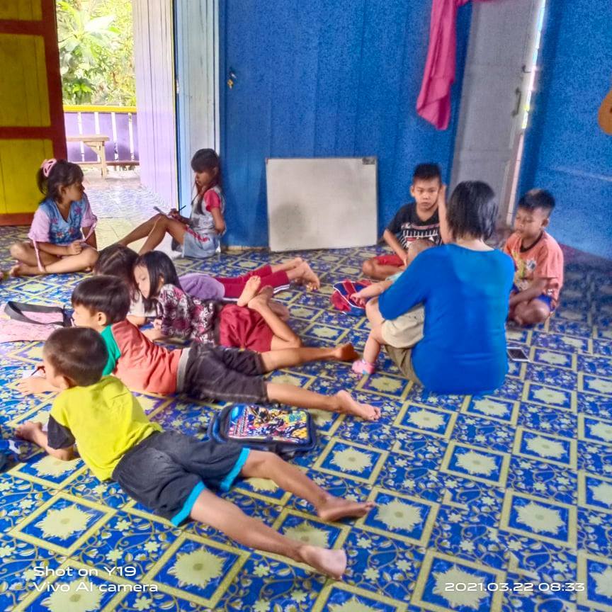 Children learning together in a classroom