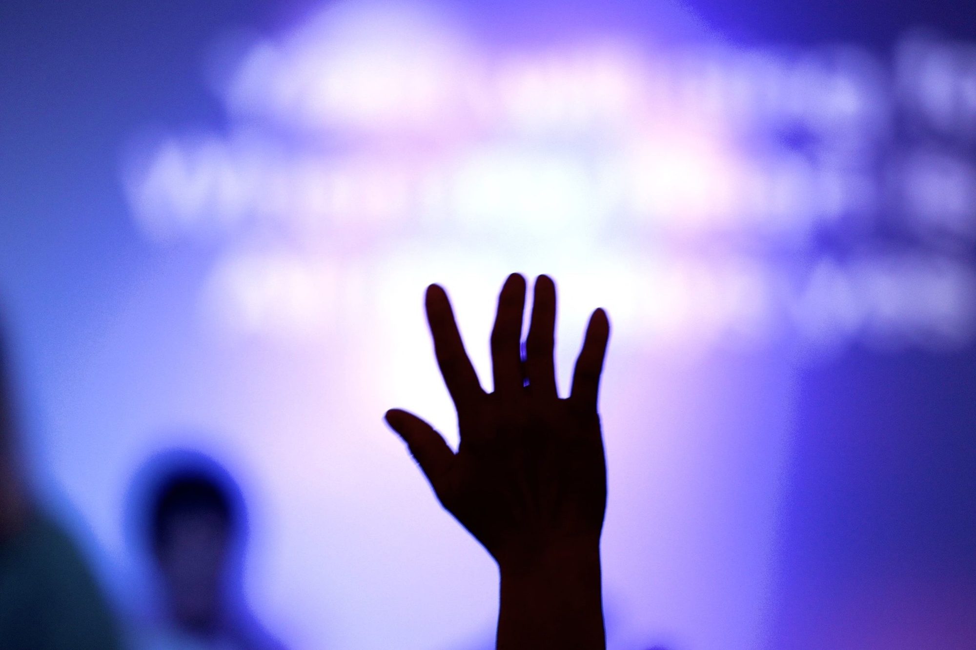 A hand raised in worship